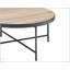 Table basse ronde de style industriel avec finition en métal et plateau en chêne gris vieilli, parfaite pour les salons modernes et rustiques.