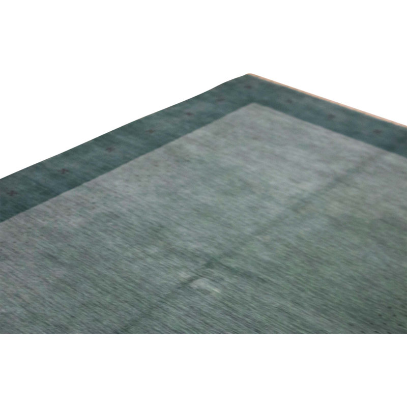 Tapis vert noué à la main de haute qualité