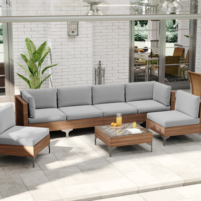 Canapé modulaire d'extérieur 7 pièces avec coussins et table basse, brun foncé