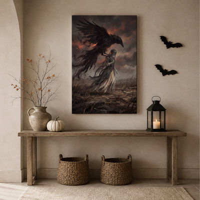 Tableau sur toile d'Halloween représentant un corbeau sombre sur une silhouette en robe dans un ciel orageux et flamboyant