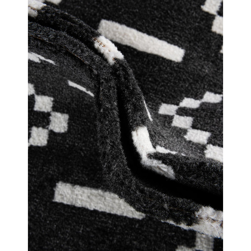 Tapis Ivy Bronx Begna Nathanyl noir, Rond 7 pi 10 po