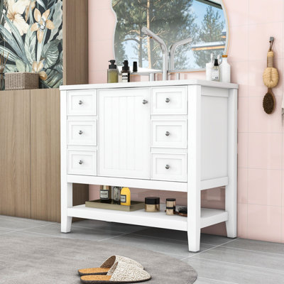 Meuble-lavabo simple autoportant moderne Tyshiem avec lavabo en céramique et grand rangement