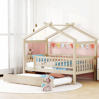 Lit en bois avec lit gigogne en bois de pin durable, conception fantaisiste pour les chambres d'enfants et espace de couchage supplémentaire.