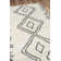 Tapis ivoire / noir Coss