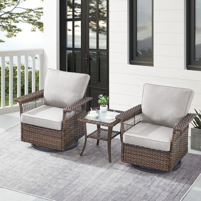 Everyn 2 - Person Outdoor Seating Group with Swivel Glide Rocker Chiar and Ottomans with Cushions