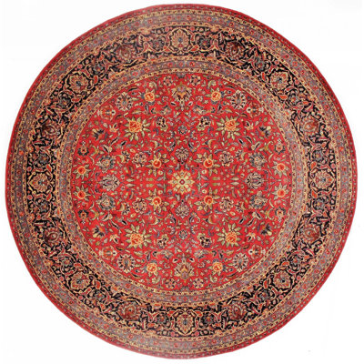 Kenniah Oriental Area Rug in Rust