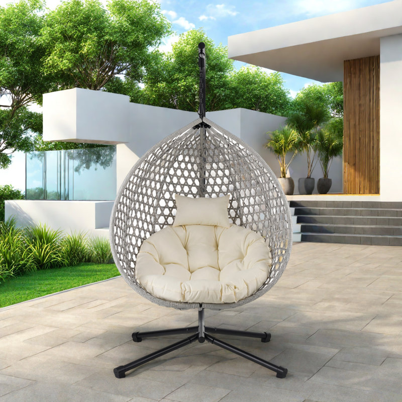 Versatile Hanging Egg Chair With Pe Rattan Hollowed-out Design, Iron Base, A Headrest And Cushion, Beige Cushion/Gray Frame