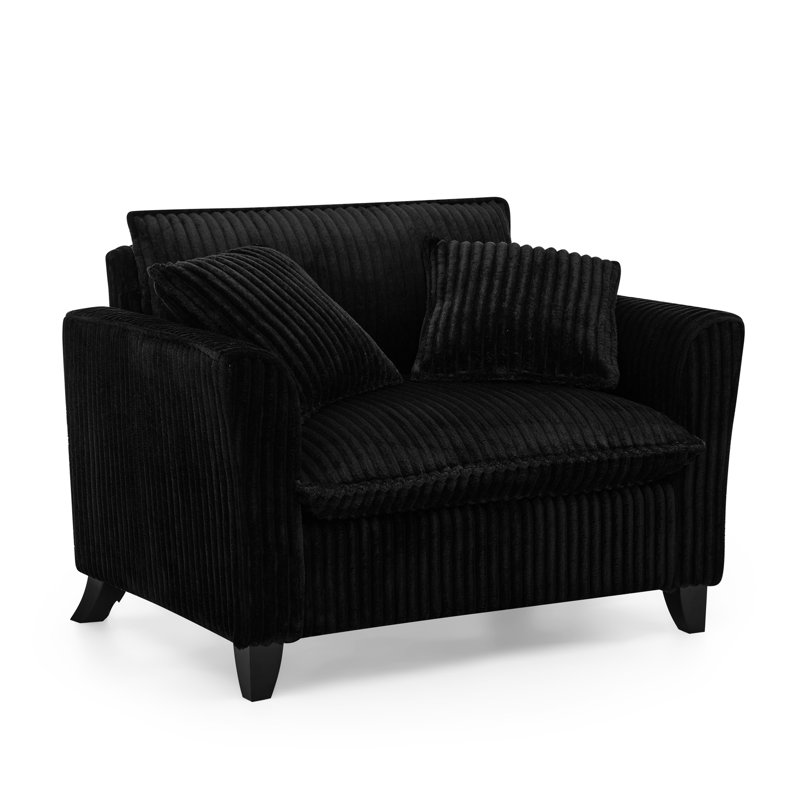 Chaise noire avec coussin de siège moelleux, adaptabilité à l'espace et plaisir de bricolage dans l'espace de la maison,