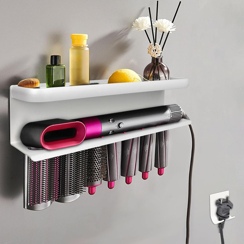 Un support de rangement mural pour fers à friser