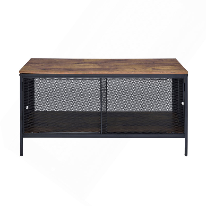 Table basse en chêne antique et noir avec 4 portes coulissantes.