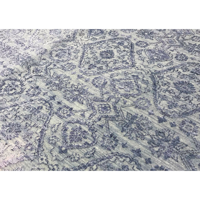 Tapis bleu clair noué à la main de haute qualité