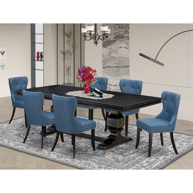 Cet ensemble de salle à manger moderne 7 pièces comprend une table de style Mid-Century et 6 chaises Parson en tissu de lin bleu avec dossier capitonné - Finition sable