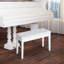 Banc de piano en blanc, rembourré de similicuir et cadre en bois pour duos