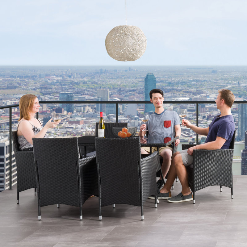 Aalliyah 6 - Person Wicker Patio Dining Set with Rectangular Table , Cushions Included