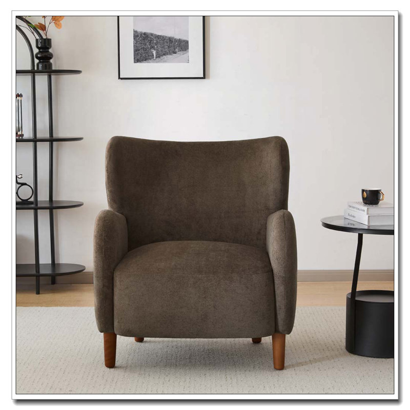 Fauteuil club à oreilles en velours