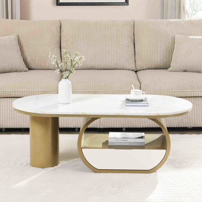 Table basse luxueuse moderne ovale de 48,58 po, métal doré avec tiroir de rangement et plateau en faux marbre pour le salon, option d'économie d'espace, structure stable, installation rapide