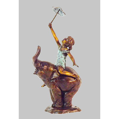 Girl on elephant