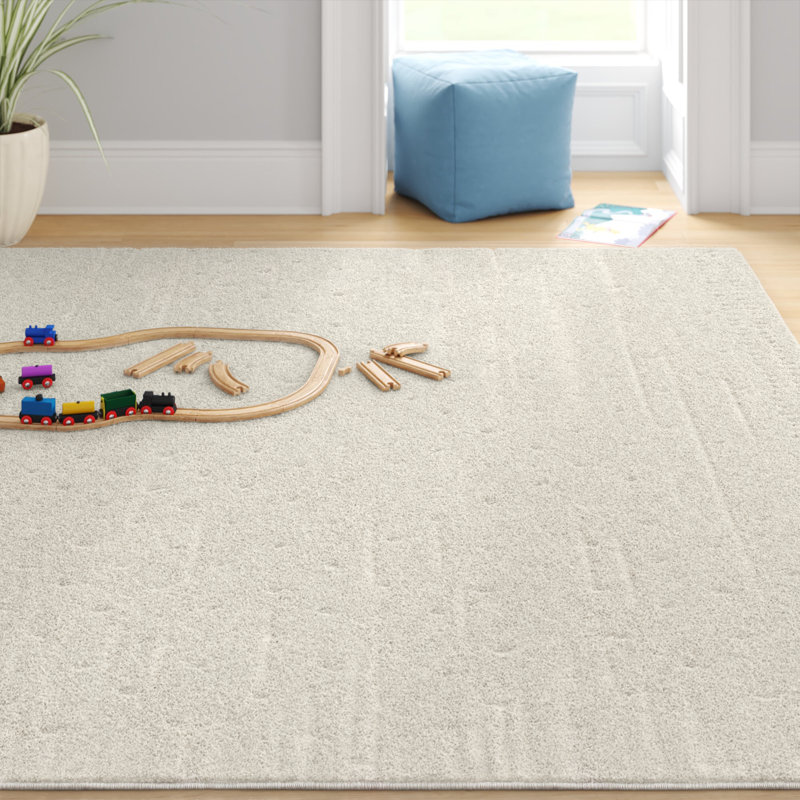 Athira Machine Woven Cream Area Rug, Rectangle 7'10" x 10'