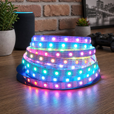 Upgraded 12V WS2815 addressable strip based on a WS2812B LED light-strip format, delivering color-changing dual-signal RGB programmable lighting across 16.4FT for WS2811 and SK6812; no power supply is included.