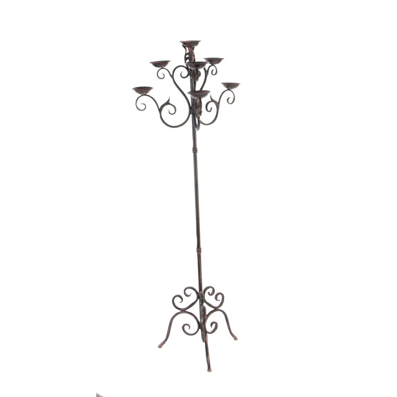 Grand candélabre brun en métal avec motifs à volutes