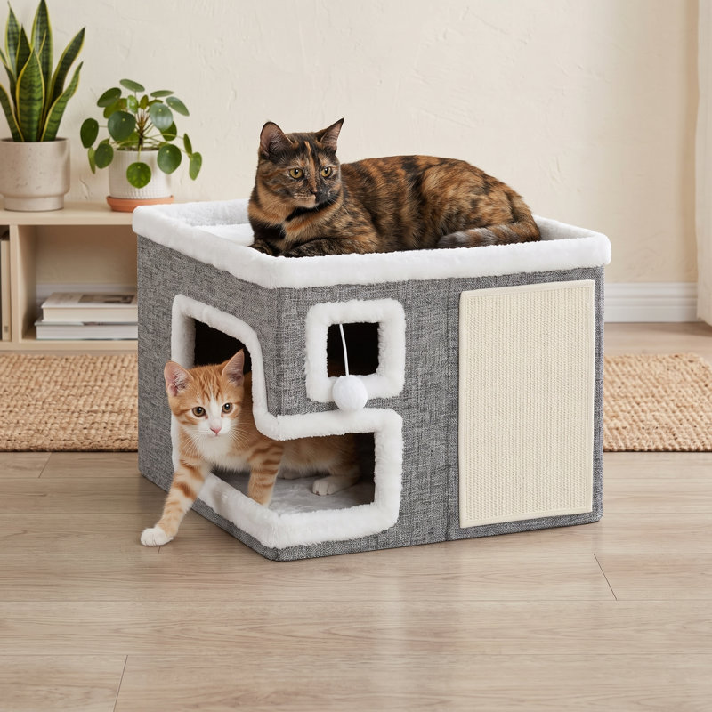 Spacieux et pliable, ce refuge pour chats est un véritable havre de paix. Son design moderne et fermé, inspiré des grottes, comprend une surface à griffer et une balle de jeu en peluche. Convient aux gros chats et aux chatons. Dimensions : 42 x 42 x 33 cm. Couleur : Gris clair.