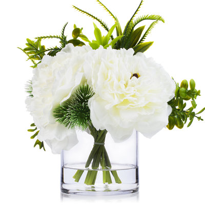 3 grands fleurs de pivoine en soie avec mélange d’eucalyptus et de verdure dans un vase en verre transparent