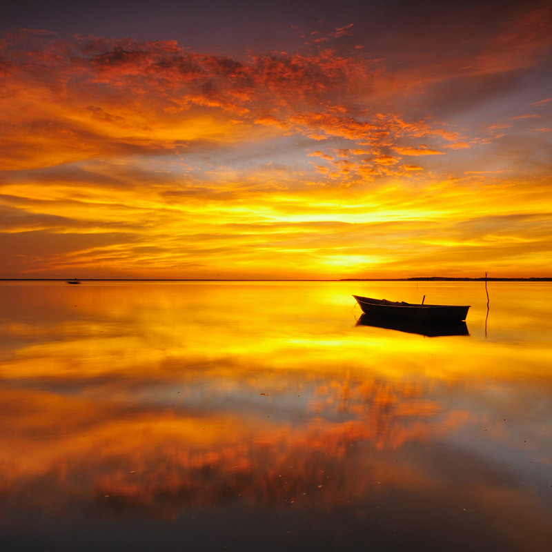 Single Boat Sunset by Tuan_azizi - Wrapped Canvas Print, 51cm H x 51cm W