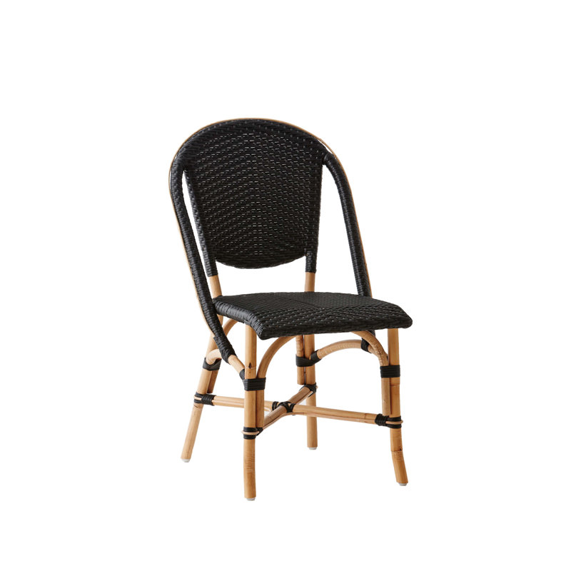 Chaise d'appoint en rotin Popplestone Sofie, Noir à pois blancs