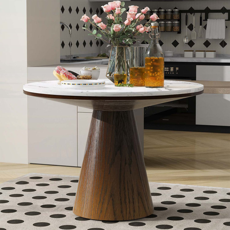 Table de salle à manger ronde pour des espaces de vie élégants et fonctionnels