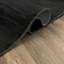 Tapis uni uni noir chiné lavable à la machine-1013412918