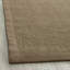 Tapis brun en jute-941770539