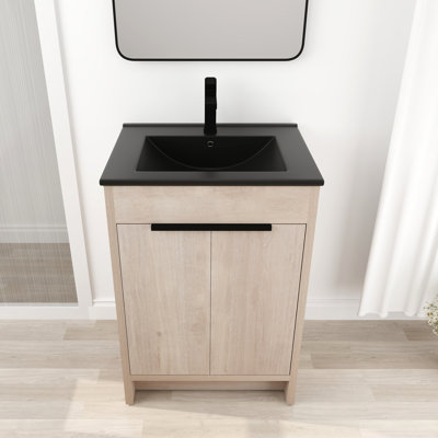 Meuble-lavabo autoportant de 24 po avec lavabo en céramique et 2 portes d'armoire à fermeture en douceur