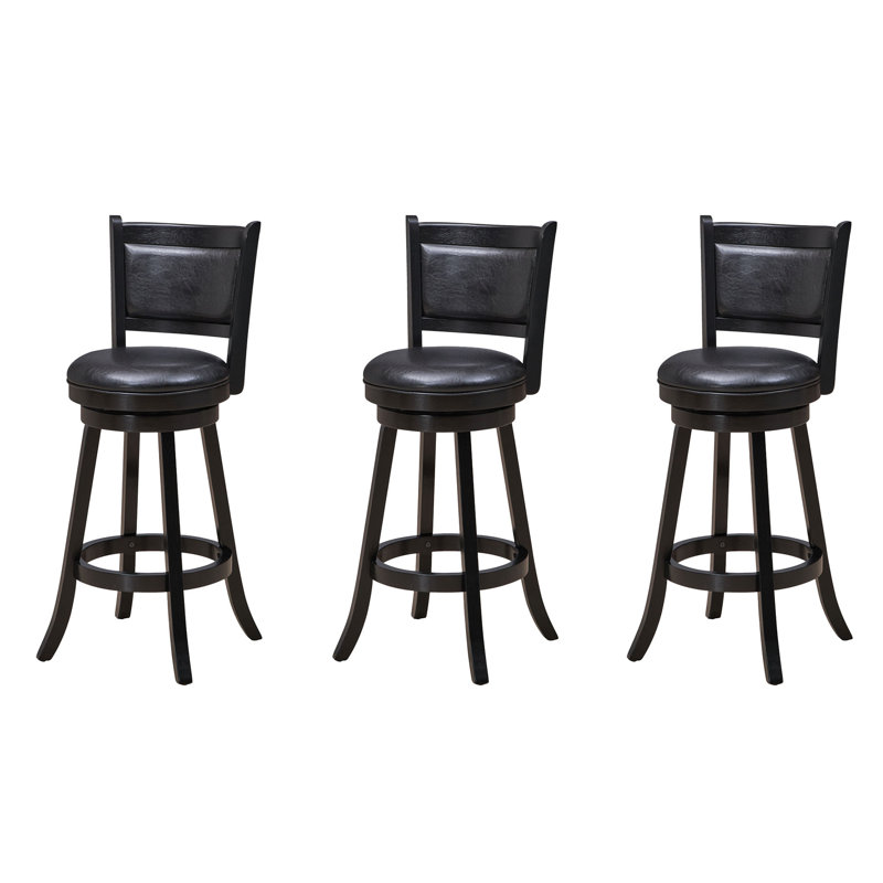 Ensemble de trois tabourets de bar adossés par la salle de jeux RAM, Noir