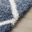 Tapis bleu à motif géométrique à treillis-31381072