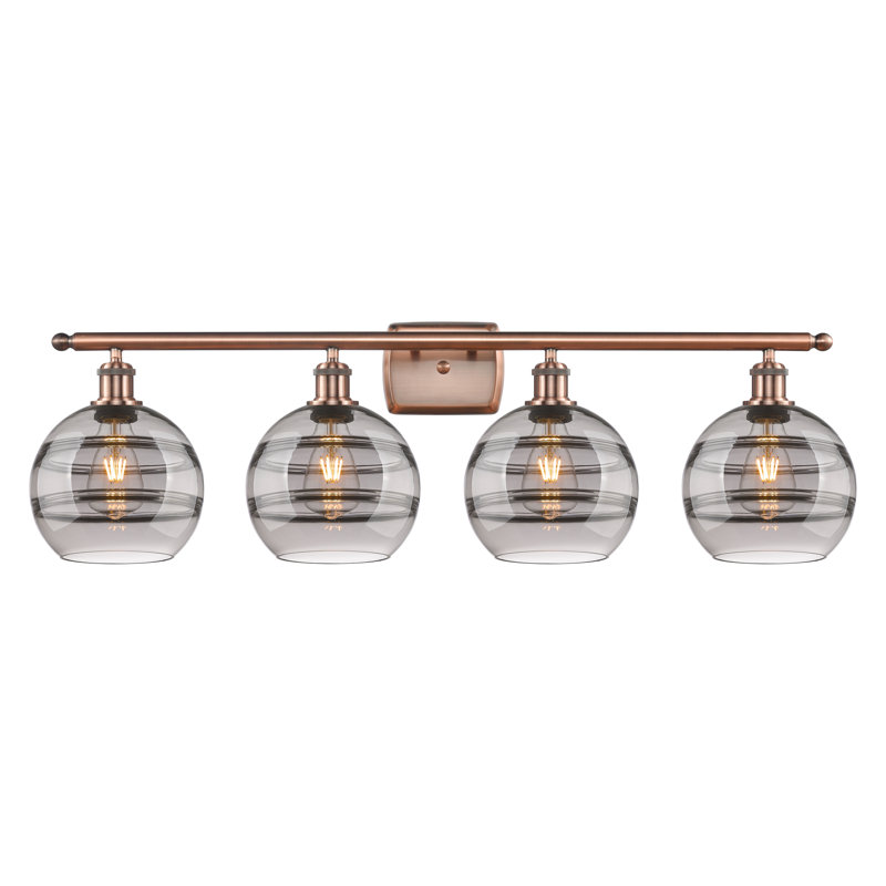 Éclairage pour meuble-lavabo à 4 lumières à intensité variable Chartoff, Transparent, Cuivre antique