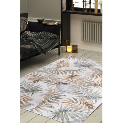 Tapis décoratif beige et brun à motif floral tissé