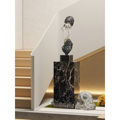 Sculpture moderne en pierre rotative