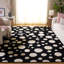Tapis noir / ivoire Kavika-559141482