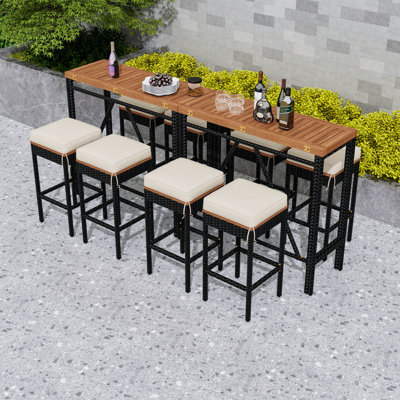 10-Piece Outdoor Acacia Wood Bar Set with Foldable Table and 8 Cushioned Stools for Patio or Garden