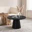 Table basse ronde de couleur noire avec base à piédestal conique, style moderne et contemporain pour le salon