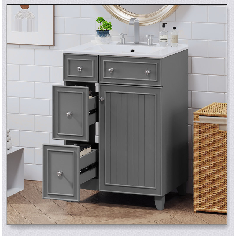 Meuble-lavabo de 24 pouces avec lavabo en céramique, porte à fermeture en douceur et deux tiroirs pour les petits espaces