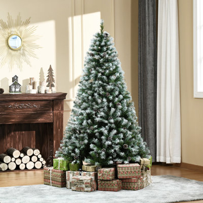 Sapin de Noël artificiel non éclairé enneigé avec branches réalistes