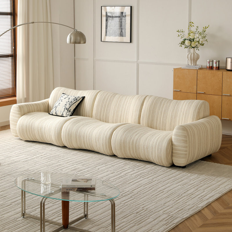 Canapé bas moderne et minimaliste de 110 pouces, recouvert de tissu texturé.