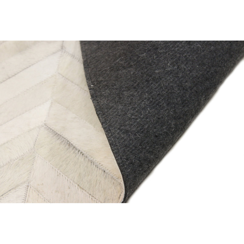 Handmade White Geometric Cowhide Patchwork Area Rug
