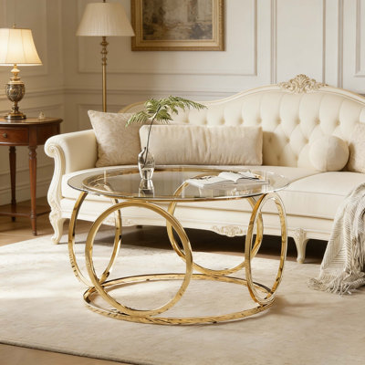Table basse ronde de 31,5 po en verre avec cadre circulaire doré, plateau en verre trempé transparent, table d'appoint contemporaine pour le salon, le bureau et le salon (verre transparent et finition dorée)