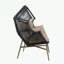 Fauteuil ovale en osier avec coussin