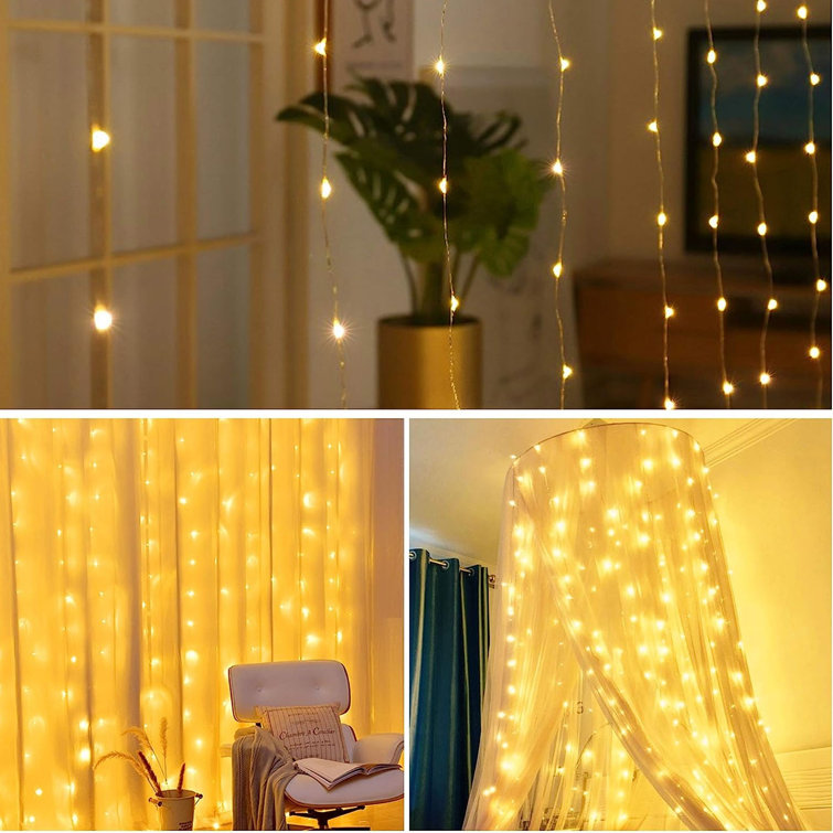 The Holiday Aisle® Window Curtain String Light, 300 Waterproof Led