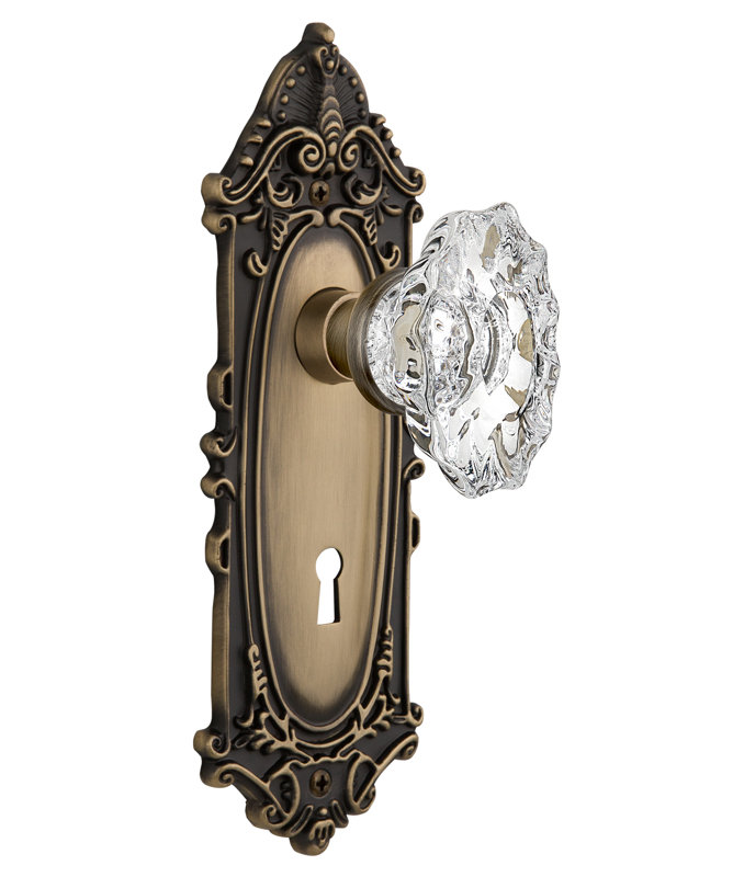 Crystal Chateau Interior Mortise Door Knob with Victorian Long Plate, Antique Brass