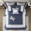 Ensemble de literie brodé bleu marine Elegant
