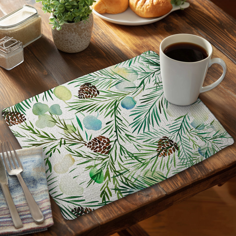 Ensemble de 4 napperons en polyester tressé motif pommes de pin